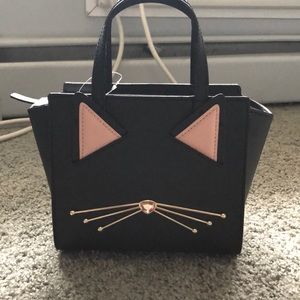 Kate spade mini hayden “jazz things up”